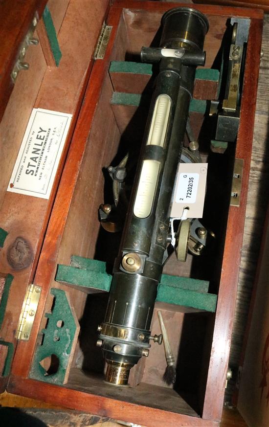 W. H. Harling surveyors Improved Reversible Level, in mahogany box, with tripod stand (2)